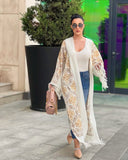 Abaya in lana ricamata in bianco