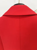 Red blazer brooch close-up