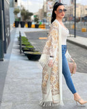Abaya in lana ricamata in bianco