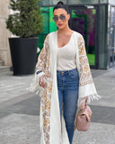 Abaya in lana ricamata in bianco