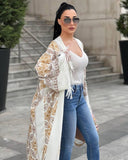 Abaya in lana ricamata in bianco