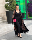 Abaya in lana ricamata in nero