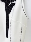 Ivory beaded bloom mini dress, back view