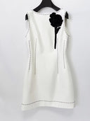 Ivory sleeveless mini dress, side view