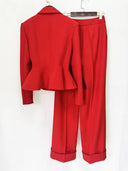 Red women's pantsuit with deep V-neck blazer