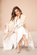 Abaya in lana ricamata in bianco