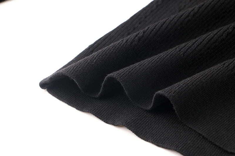 Top Sia in lana a maniche lunghe in nero