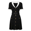 Black rib-knit belted mini dress with white collar