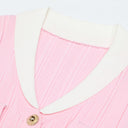 Pink knit dress white contrast V-collar detail