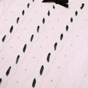 Cable-knit texture with black ribbon lacing
