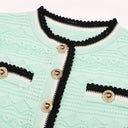 Mint knit cardigan scalloped black trim and gold buttons detail