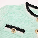 Mint knit cardigan pocket with gold button detail