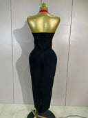Red and black halter midi dress, open back view
