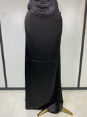 Black satin maxi skirt detail