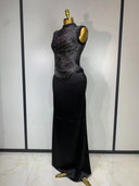 Black fringe top and satin skirt three-quarter view