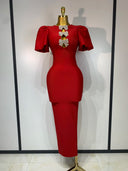Red bandage midi dress with crystal bow keyhole cut-outs and puff sleeves