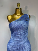 One-shoulder draped neckline close-up