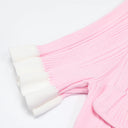 Pink knit dress white ruffle sleeve detail