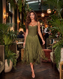 Model wearing the olive fringe bandage dress