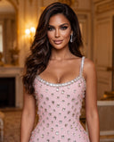 Model wearing the pink crystal ruffle mini bandage dress