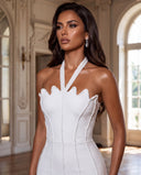 Model wearing the white sculpt beaded gown